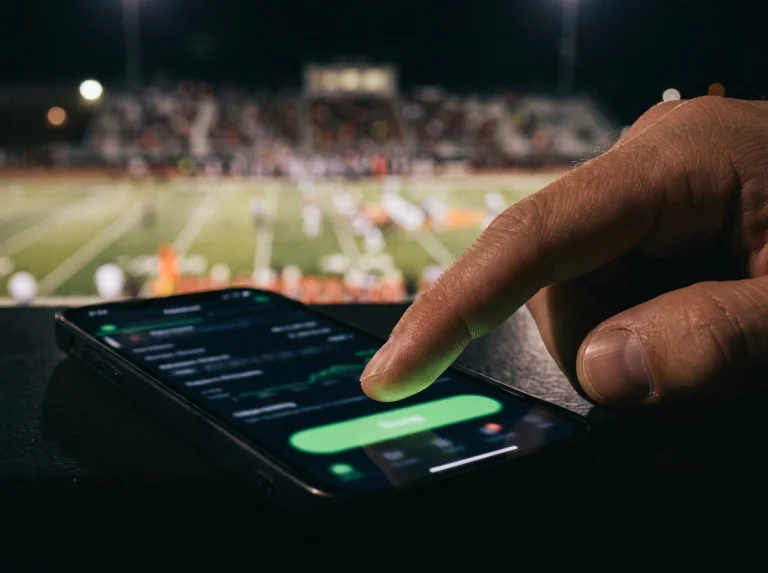 Betting slip with a cash-out button highlighted during a live NFL game